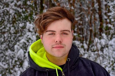 Portrait of teenage girl in snow