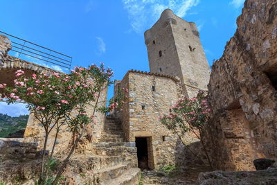 Low angle view of old building against sky