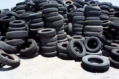 Close-up of tires stack on land