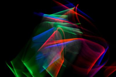 Close-up of light painting against black background