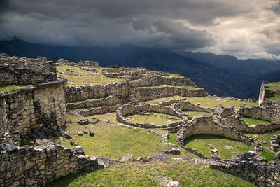 Aerial view of old town against cloudy sky