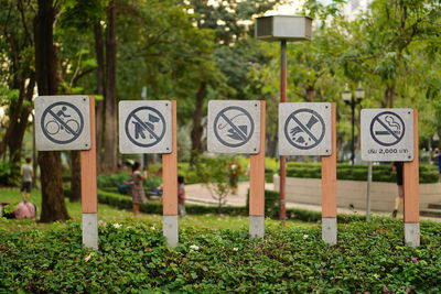 Information signs on grassy field