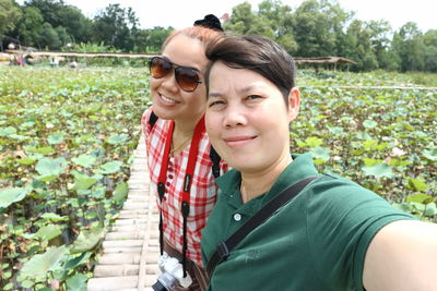 Portrait of smiling young couple outdoors