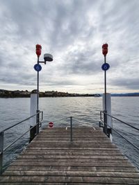 Pier on sea against sky