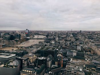 Aerial view of cityscape against sky