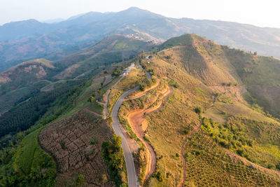 Mountain path at morning travel trip aerial landscape view from drone