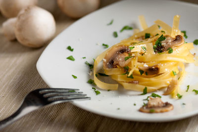 Close-up of pasta in plate on table