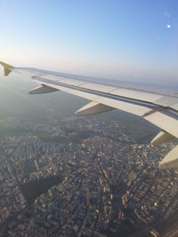 Aerial view of city against sky