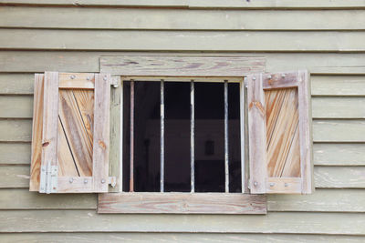 Low angle view of window in old building