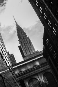 Low angle view of modern buildings against sky