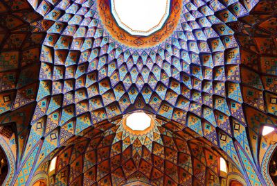 Low angle view of illuminated ceiling of building