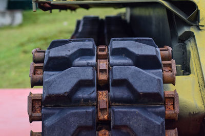 Close-up of old machine on field