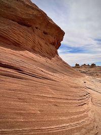 Hiking at the bee hive loop with blue sky and desert rock formations near page, arizona