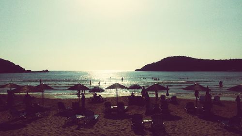 Scenic view of beach against clear sky