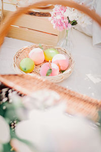 High angle view of fruits in basket on table