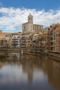 Reflection of buildings in water, , girona spain