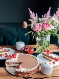Close-up of various flowers on table