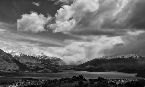 Scenic view of snowcapped mountains against sky