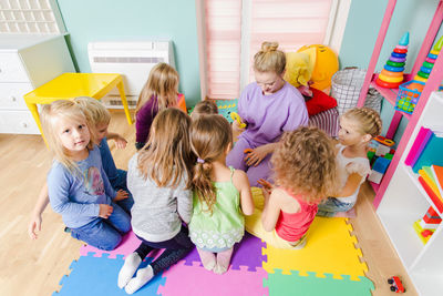 High angle view of people on multi colored wall