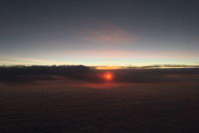 Scenic view of landscape against sky during sunset