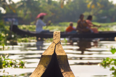 High angle view of people on boat in river