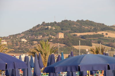 Panoramic view of buildings in city against clear sky