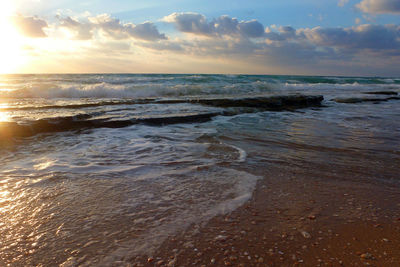 Scenic view of sea against sky during sunset