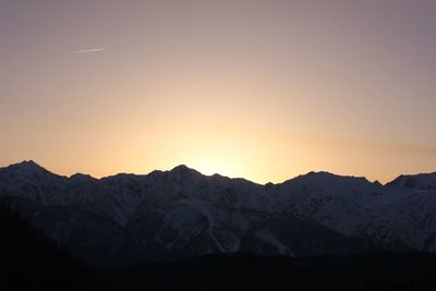 Scenic view of mountains against sky during sunset