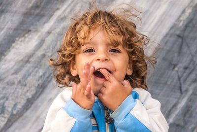 Portrait of cute boy eating food