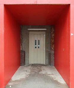 Closed door of red building