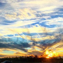 Scenic view of landscape at sunset