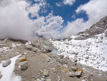Scenic view of mountains against sky during winter