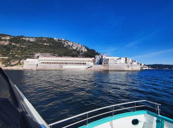 Scenic view of sea against blue sky