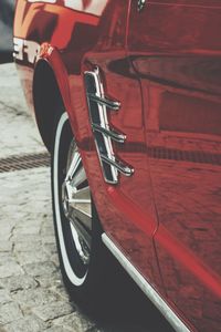 Close-up of vintage car on street