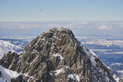 Scenic view of snowcapped mountain against sky