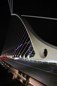 View of illuminated bridge at night