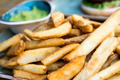 Close-up of french fries on table