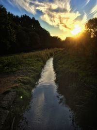 Scenic view of sunset over river