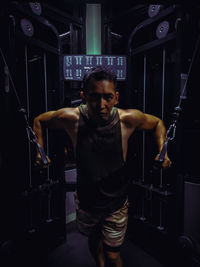 Full length of young man standing at home