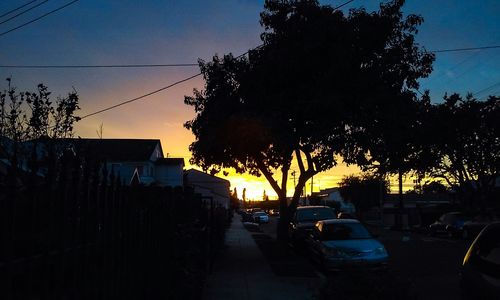 Car on road at sunset