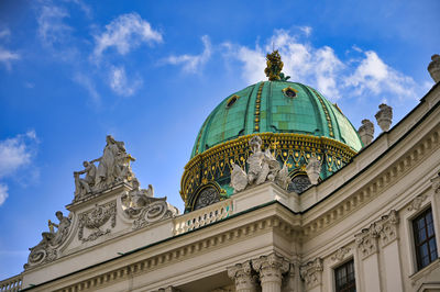 Low angle view of statue of building against sky