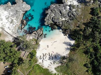 High angle view of rocks by sea