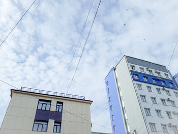 Low angle view of buildings against sky