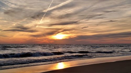 Scenic view of sea against sky during sunset