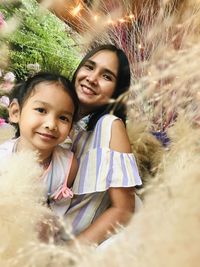 Portrait of happy mother and daughter