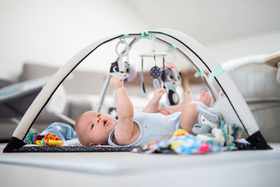 Portrait of cute baby girl in basket