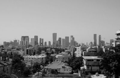 High angle view of buildings against clear sky