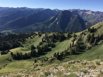 Scenic view of landscape and mountains against sky