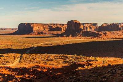 Scenic view of rock formations against sky