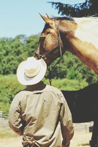 Rear view of cowboy